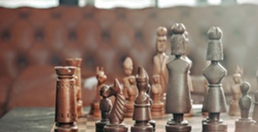 leveled view of chess pieces on a board